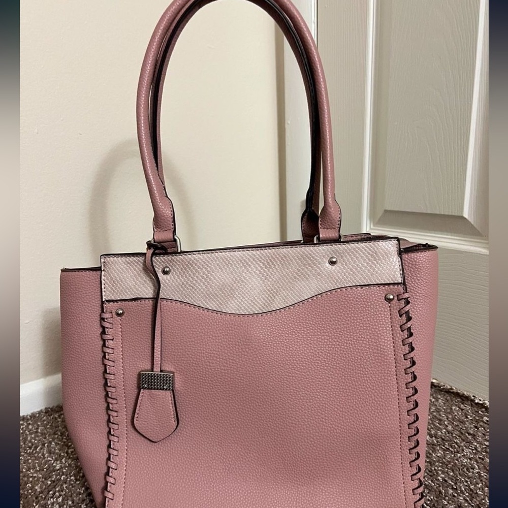 New never used pink woman purse.